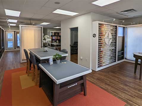 Store interior showcasing several different types of window coverings